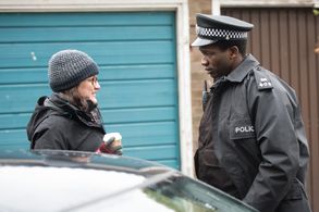 Director Kate Herron and actor Sope Dirisu behind the scenes on 