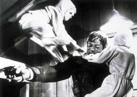 Oliver Reed and Felix Silla in The Brood (1979)