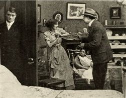 Walter Edwin, Gertrude McCoy, Charles Ogle, and Edna May Weick in The Usurer's Grip (1912)