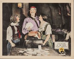 Enid Bennett, Barbara La Marr, and Matt Moore in Strangers of the Night (1923)