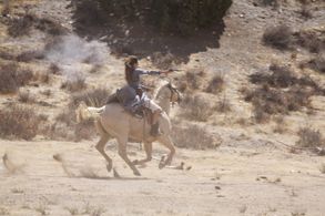 Firearm and equine stunts performed in 