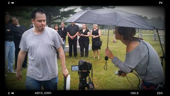 I helped with he sound in he funeral scene of Cellar Secret. It was a dreadful, rainy, windy day, but the scene was on p