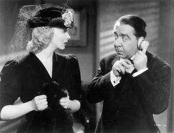 Virginia Bruce and Herbert Mundin in Society Lawyer (1939)