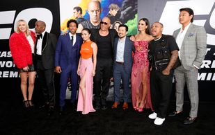 Charlize Theron, Vin Diesel, Jordana Brewster, Sung Kang, Shad Moss, Justin Lin, Ludacris, Tyrese Gibson, and Anna Sawai