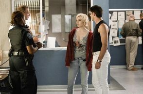 Aidan Devine, Charlotte Sullivan, and Travis Milne in Rookie Blue (2010)