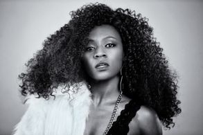 Phylicia Wissa as British Pop singer, 