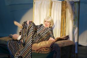 As Lina Lamont in SINGING IN THE RAIN