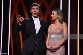 Coco Jack Gillies and Sean Keenan presenting at the 2022 AACTA Awards