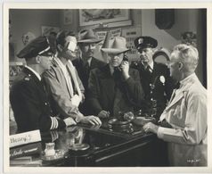 Robert Young, Cliff Clark, John Gallaudet, and Lee Phelps in Joe Smith, American (1942)