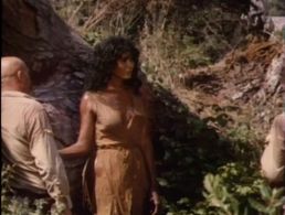 Serafino Profumo and Ajita Wilson in Escape from Hell (1980)