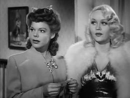 Marion Martin and Frances E. Neal in Powder Town (1942)