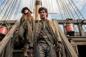 Toby Schmitz and Clara Paget in Black Sails (2014)
