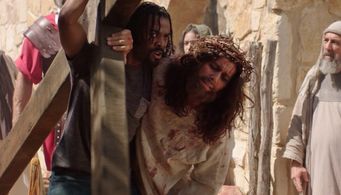 Simon helping Jesus carry the cross. Assassin 33 AD