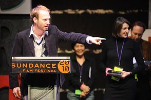 Director of Photography Michael Lavelle accepts the World Cinema Cinematography Award for Documentary for 