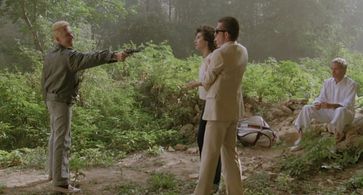 John Hurt, Tim Roth, Terence Stamp, and Laura del Sol in The Hit (1984)