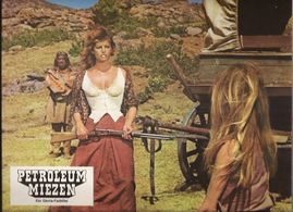 Brigitte Bardot, Claudia Cardinale, and Valéry Inkijinoff in The Legend of Frenchie King (1971)