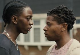 Joshua Cameron and Rasaq Kukoyi in Held (2022)