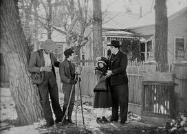 Peggy Cartwright, James Gordon, Winston Miller, and Will Walling in The Iron Horse (1924)