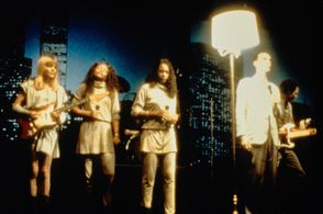 David Byrne, Jerry Harrison, Talking Heads, and Tina Weymouth in Stop Making Sense (1984)