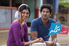 Dulquer Salmaan and Malavika Mohanan in Pattam Pole (2013)