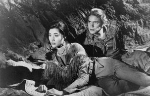 Scott Bairstow and Charmaine Craig in White Fang 2: Myth of the White Wolf (1994)