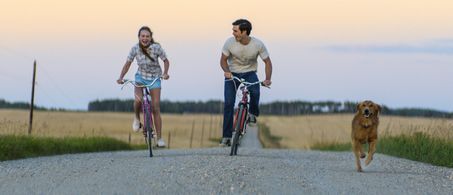 Josh Gad, Britt Robertson, and K.J. Apa in A Dog's Purpose (2017)