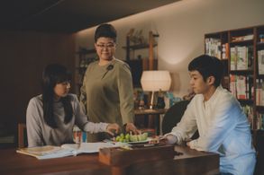 Choi Woo-sik, Lee Jeong-eun, and Jung Ji-so in Parasite (2019)