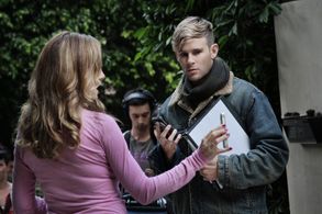 Director Bryan Fox discusses angles with the Nosey Neighbor played by Kelly Preston.