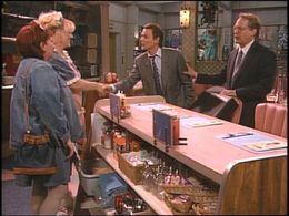 Roseanne Barr, Bonnie Bramlett, Michael Des Barres, and Martin Mull in Roseanne (1988)