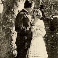 Mildred Harris and Richard Stanton in The Wheels of Destiny (1913)