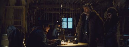 Jennifer Jason Leigh, Michael Madsen, Tim Roth, and Kurt Russell in The Hateful Eight (2015)