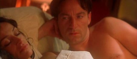 Jason Isaacs and Sofia Milos in Passionada (2002)