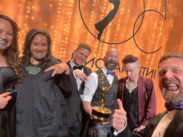 Max Currie [centre] and the Rūrangi team with their 2022 International Emmy for Best Short-form Series