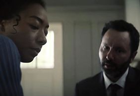 Michael G Welch on Clickbait as the Mortician with Betty Gabriel as Sophie Brewer.