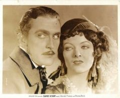Myrna Loy and Douglas Gilmore in Cameo Kirby (1930)