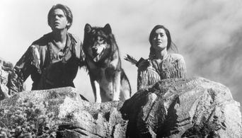 Scott Bairstow, Charmaine Craig, and Jed in White Fang 2: Myth of the White Wolf (1994)