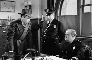 Wade Boteler, Cy Kendall, and Richard Travis in The Last Ride (1944)