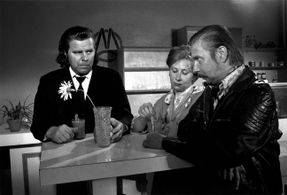 Kati Outinen, Matti Pellonpää, and Mato Valtonen in Take Care of Your Scarf, Tatiana (1994)