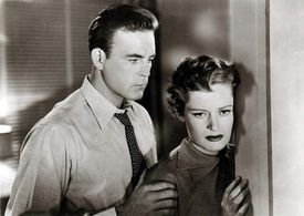 Scott Brady and Alexis Smith in Undercover Girl (1950)