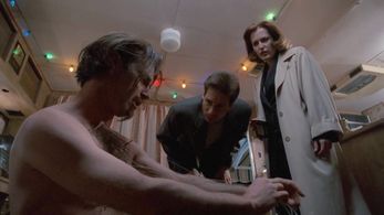 Gillian Anderson, David Duchovny, and Jim Rose in The X-Files (1993)