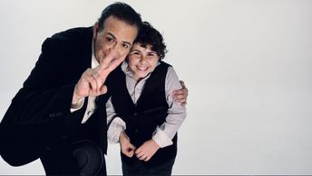 John Henry and his son Marek Graham on the set of “Hargrave”.