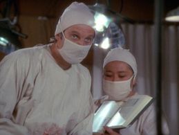 Alan Alda and Kellye Nakahara in M*A*S*H (1972)