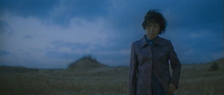 Hye-ja Kim in Mother (2009)