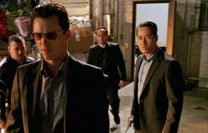Jeffrey Donovan and Eric Esteban in Burn Notice (2007)