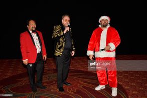 (L-R) Bill Victor Arucan, Greg Tally and James Balsamo emcee Raven Van Slender Saves Christmas! Premiere on stage at the