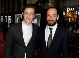 Actor Dave Patten (L) and director Ken Scott arrive at the premiere of DreamWorks Pictures' 'Delivery Man' at the El Cap