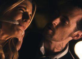 Andrea Bogart and Sean Naughton in The Action Hero's Guide to Saving Lives (2009)