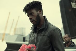 A still of Alessandro Babalola ( portraying 'Haze' ) in Netflix's Top Boy.