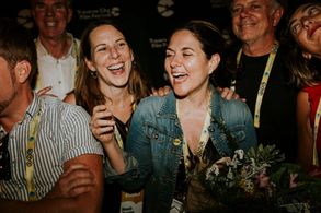 director Dava Whisenant (right) at the Traverse City Film Festival after her win for Bathtubs Over Broadway