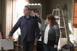Eric Stonestreet and Dana Powell in Modern Family (2009)